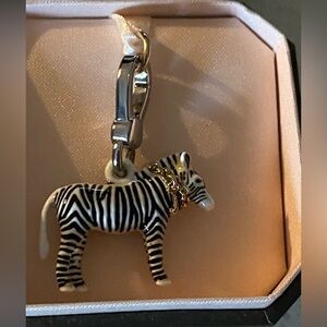 NWT and Box Juicy Couture Zebra bracelet or pendant blk & White has gold tone